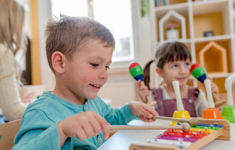 Preschool Children Playing Music Using Various Colorful  Instruments