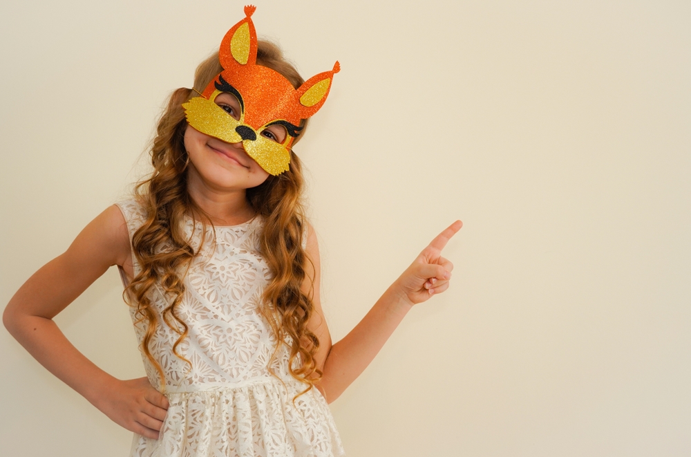A,Child,In,A,Carnival,Masquerade,Mask,Of,A,Squirrel